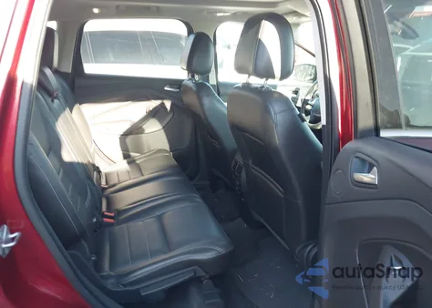 2014 Ford Escape Titanium z USA, uszkodzony, nr VIN 1FMCU9J91EUC56419